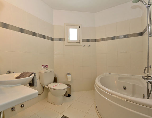 Bathroom with hot tub